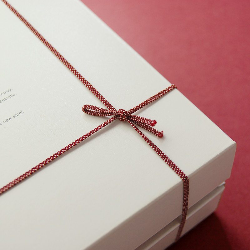 バウムクーヘン(プレーン・カラメル)のネーミング/ パッケージデザイン/リーフレット制作